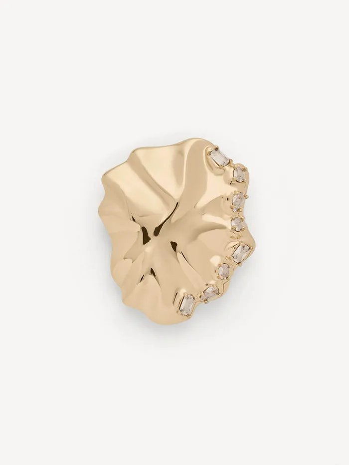 Elliot Brooch: an organically shaped gold brooch with crystal accents